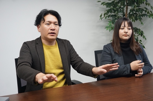 取締役執行役員経営企画本部本部長 加美山 学 様 / 経営企画本部企画管理部スタッフ戦略課課長 福崎 麻里絵 様